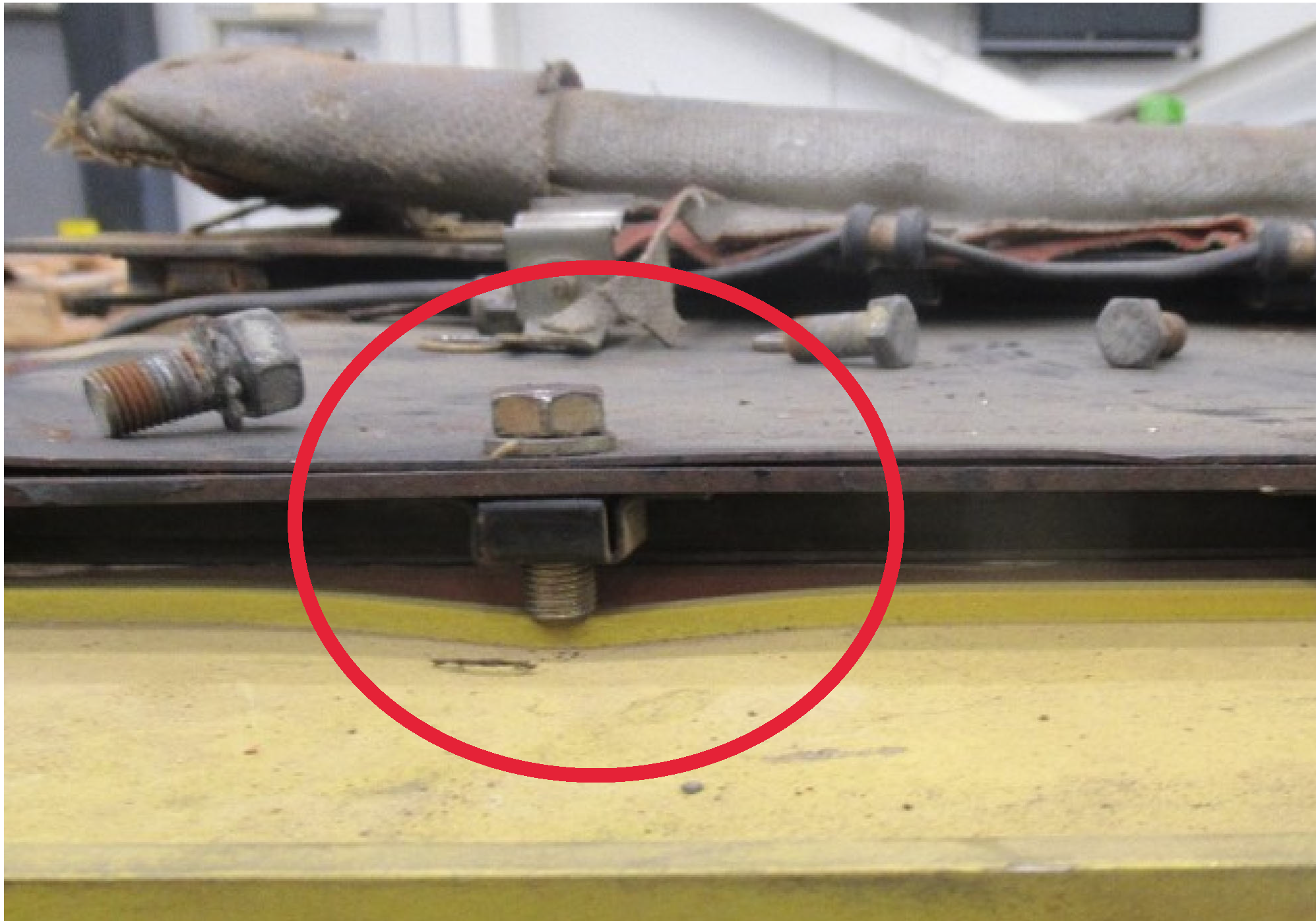Using wrong bolts can damage engine oil cooler